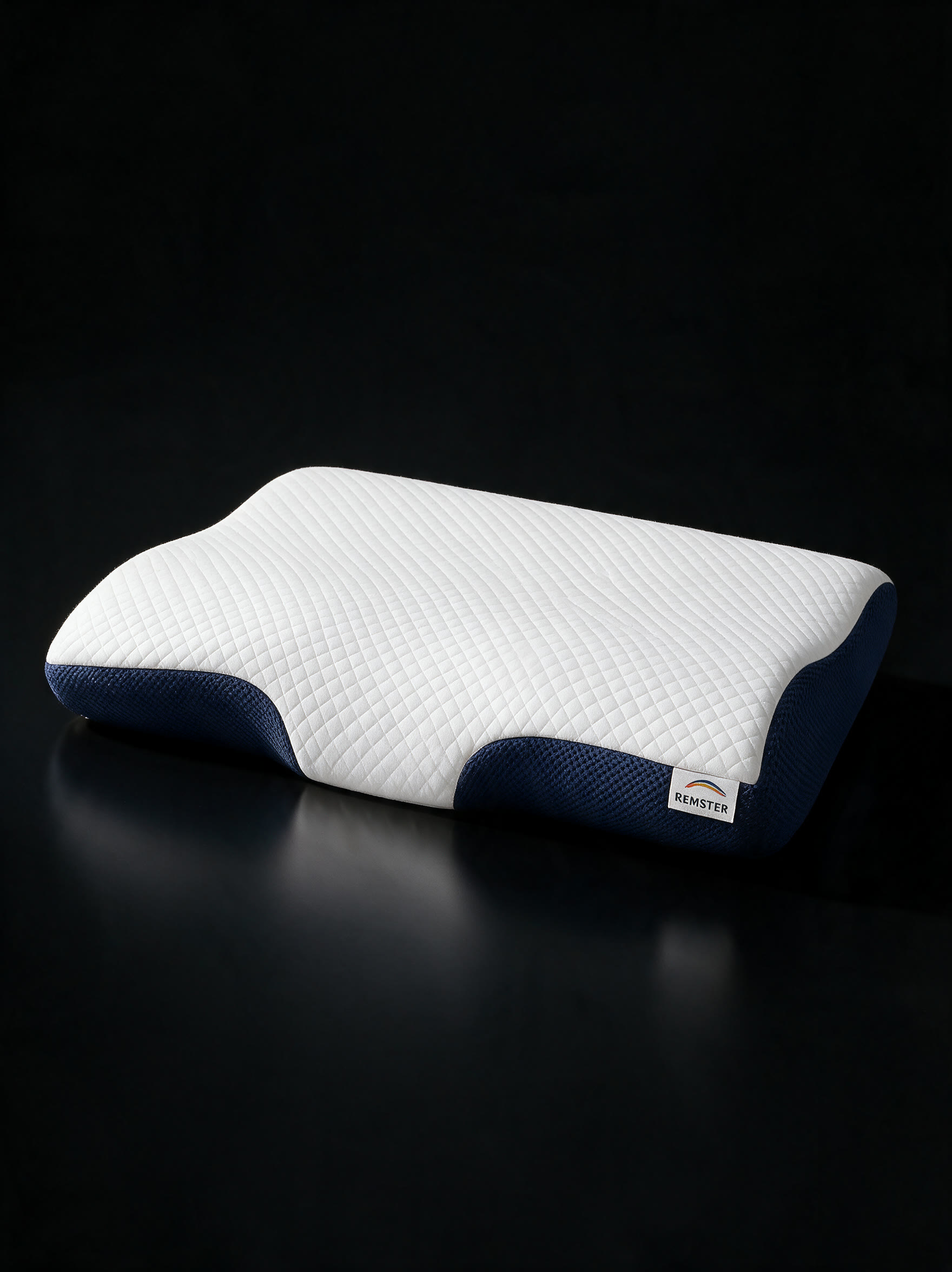 Two Remster cervical pillows, one for each side of the bed