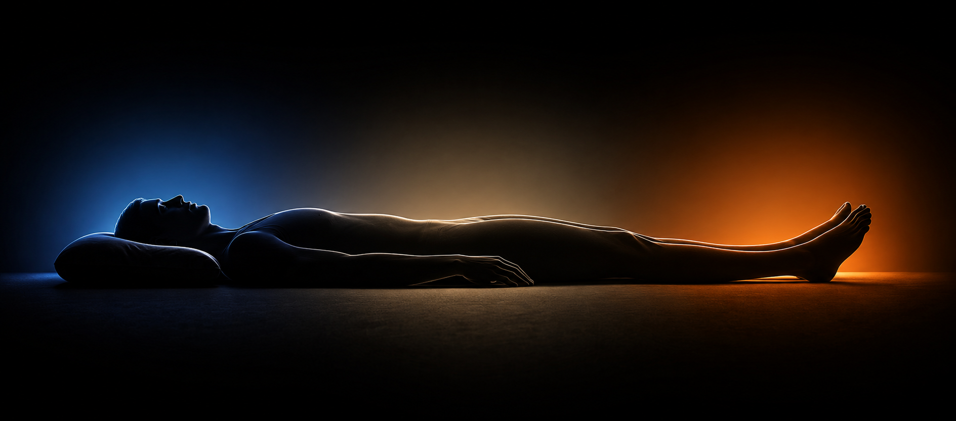 Silhouette of a body lying down showing four temperature zones: head, neck, core and feet